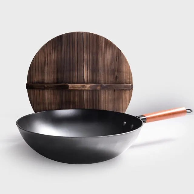 Traditional black iron wok with long wooden handle, 32cm cooking surface