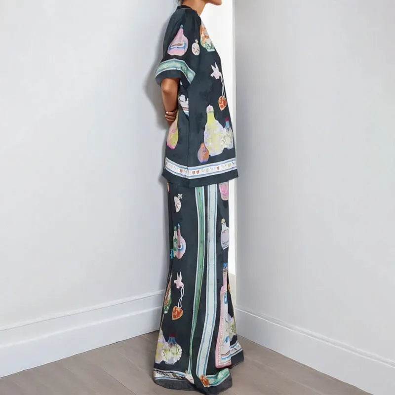 Black women's cardigan and trouser set with cartoon animation print
