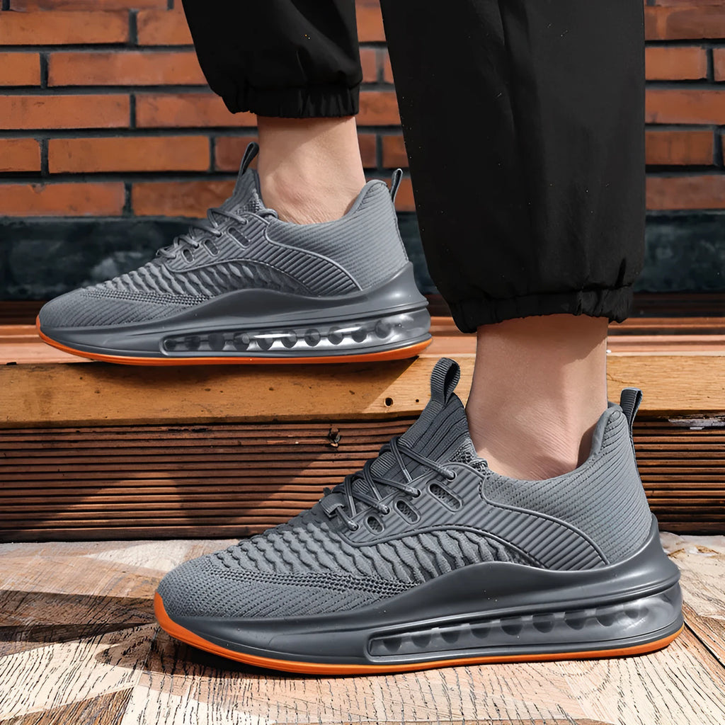 Men's low-top black mesh running shoes with white sole and lace-up front.