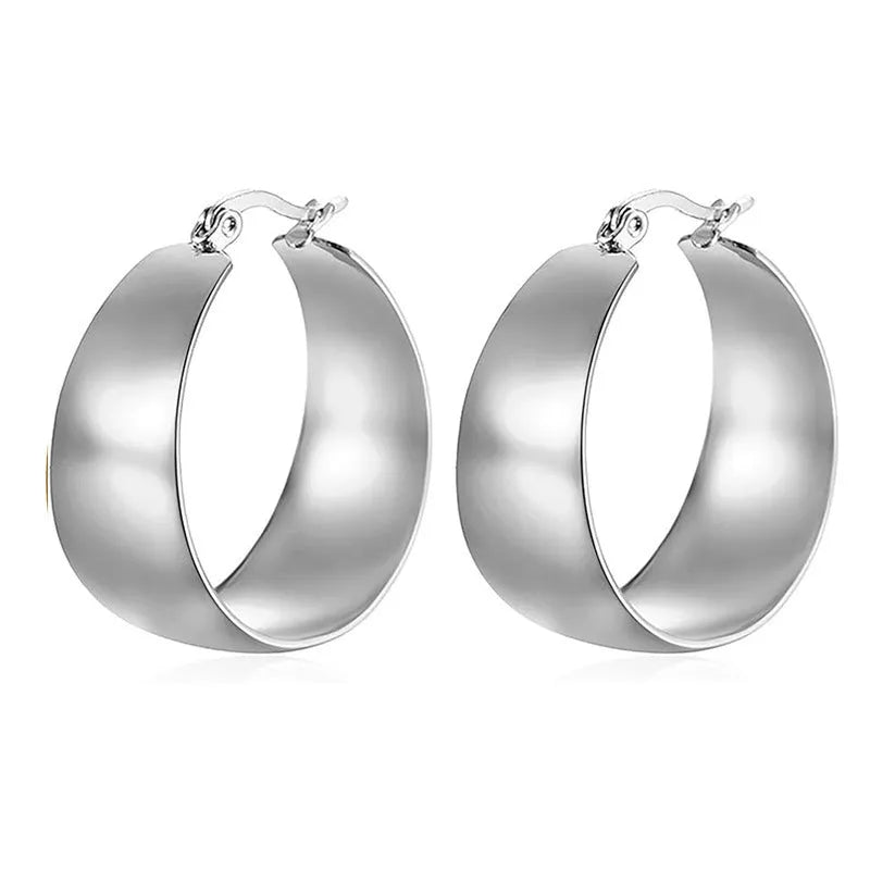 Widened curved stainless steel earrings in gold or steel colour with 25mm and 30mm size options