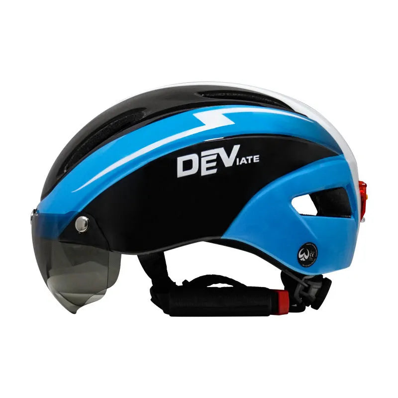 Adult bicycle helmet with integrated red taillight on the rear, shown in a black and blue colour variant.