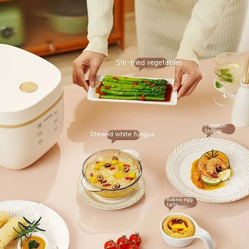 White or beige 3L multi-function rice cooker with black inner pot and included accessories