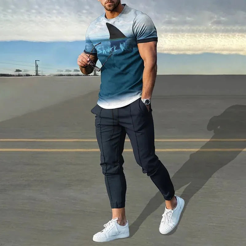 Men's casual printed short sleeve pullover and matching trousers suit set on a white background.