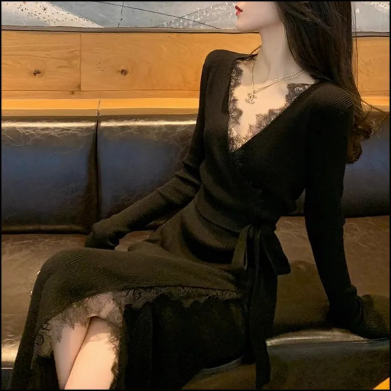 Black women's slim fit woolen skirt with a princess dress silhouette on a hanger.