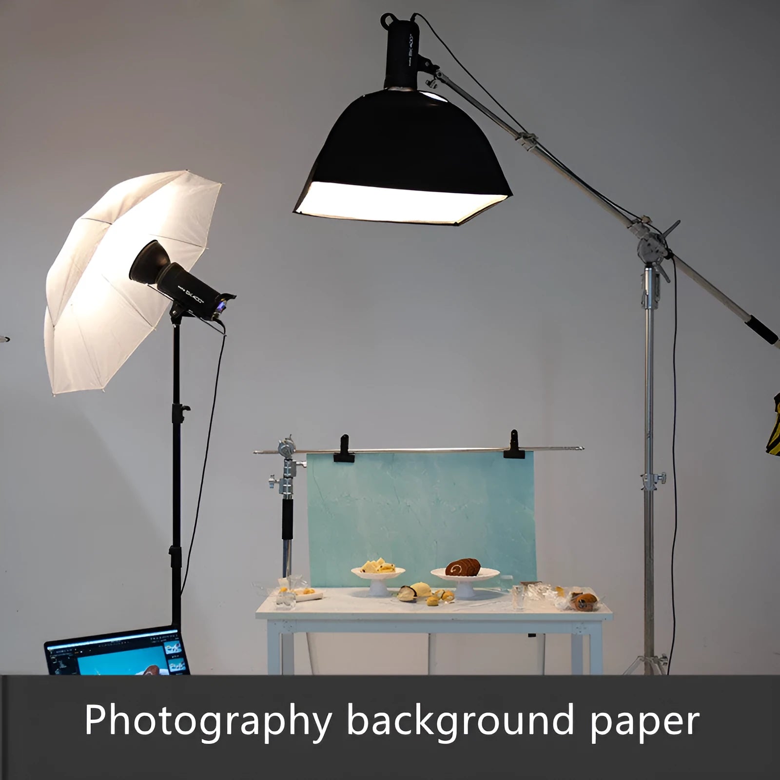 Double-sided marble texture photography background paper sheet on a table.