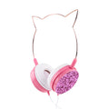 Wired over-ear headphones with adjustable headband and built-in microphone available in four colours