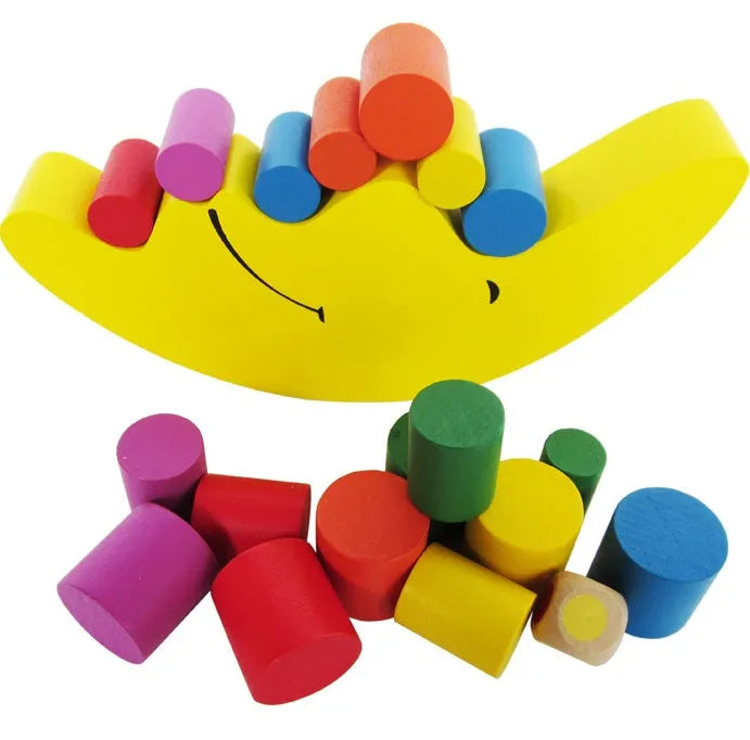 Wooden Moon balance toy in blue and yellow colours for toddlers aged 2-4 years