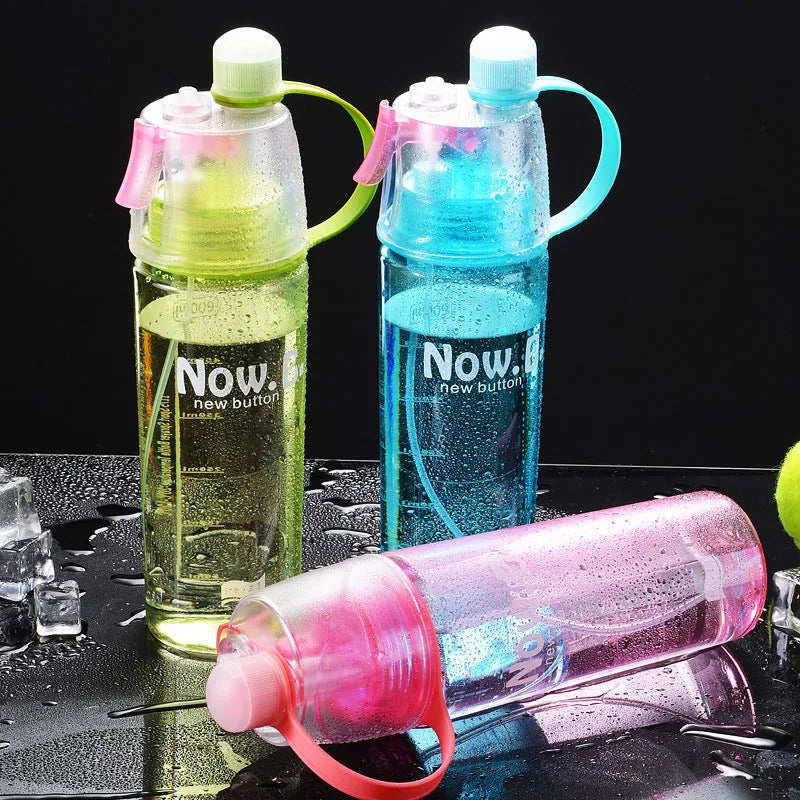Green portable outdoor mist spray cup with handle and scale markings