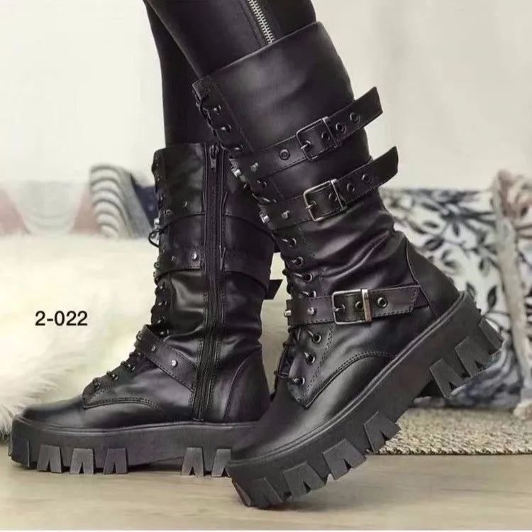 Women's black mid-calf knight boots with a large metal buckle and side zipper detail.