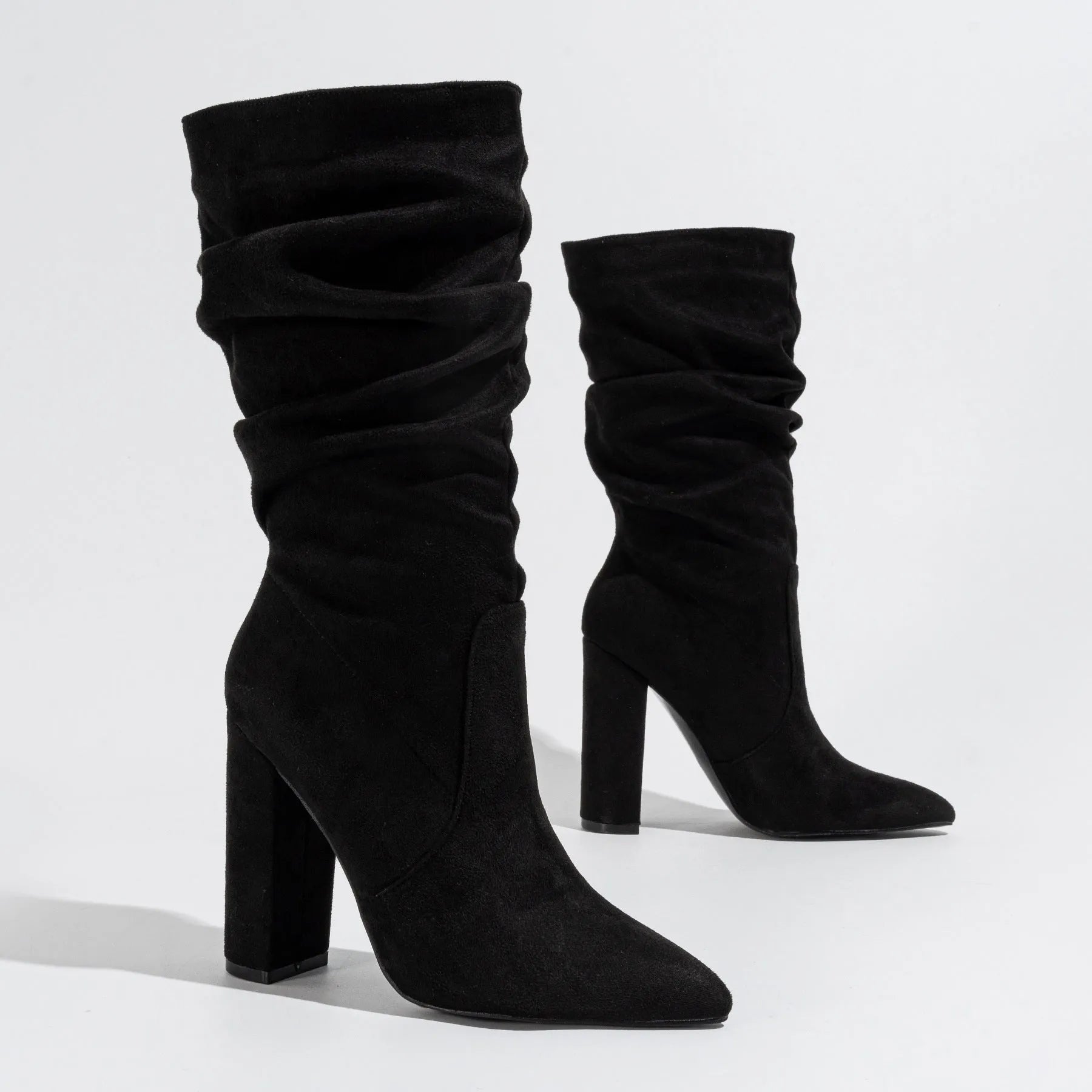 Women's black suede chunky heel pointed toe boots with mid-calf length