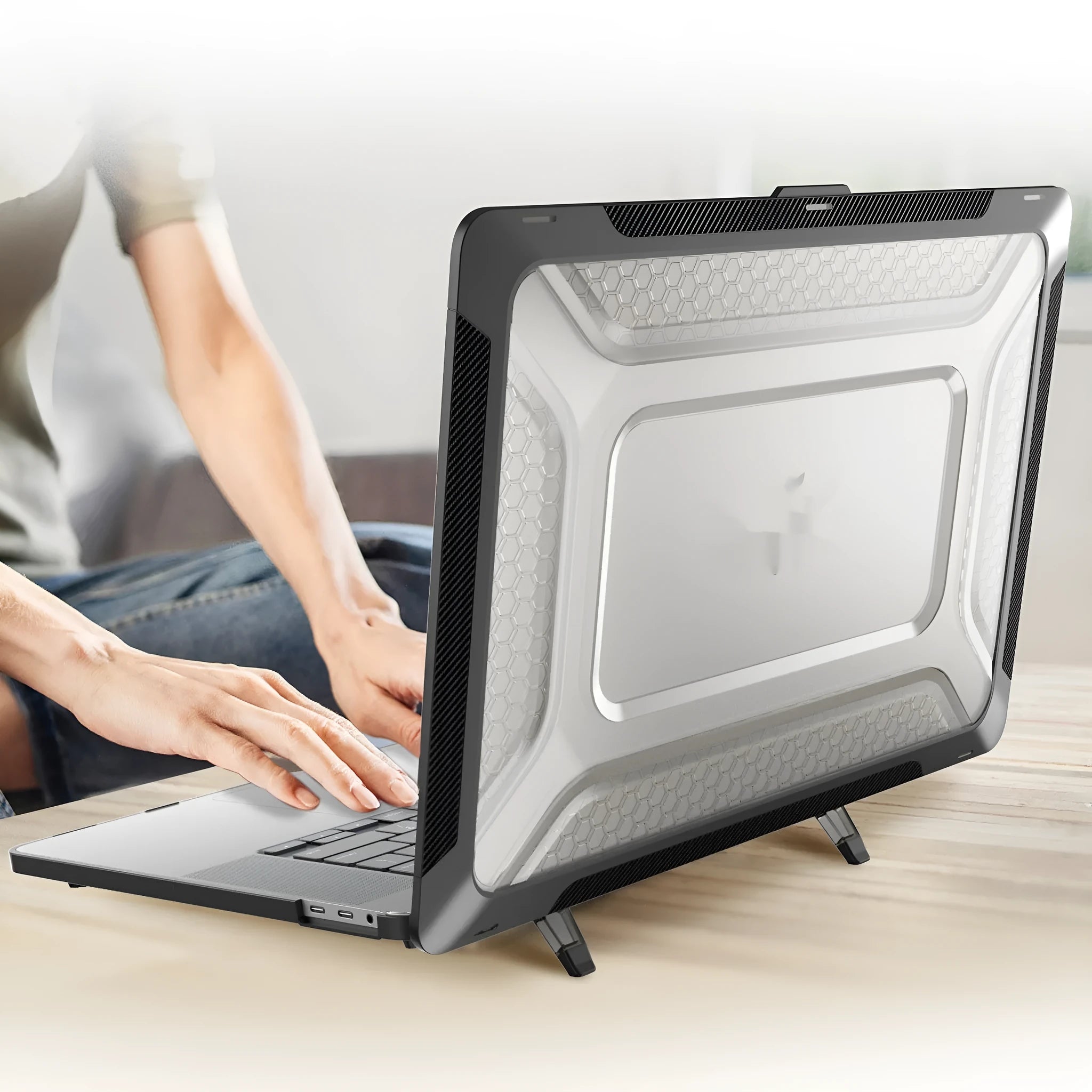 MacBook protective shell case shown in cold black, starry sky grey, elegant apricot, and sapphire blue colours.