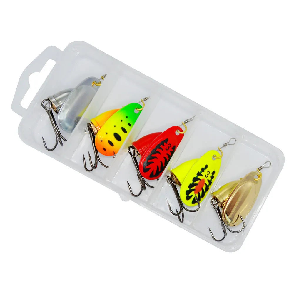 R Composite metal fishing lure with rotating sequins and copper bell in multiple colour options including gold, red, and silver.