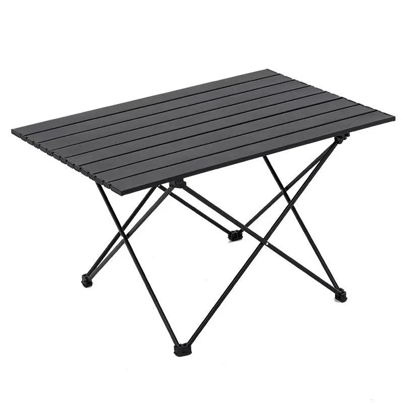 Ultralight aluminium alloy folding table in black carbon steel finish, folded flat for storage