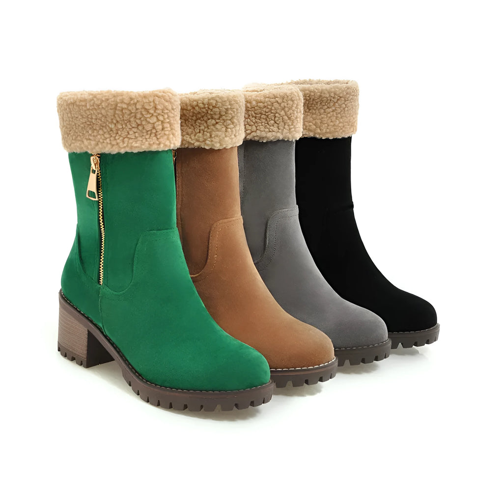A pair of adult snow boots in black with a soft plush lining and rubber insole.