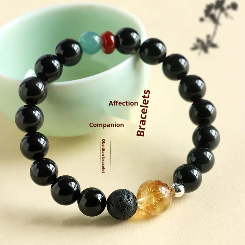 Chinese style obsidian and agate jade couple bracelet with yellow tower crystal beads.
