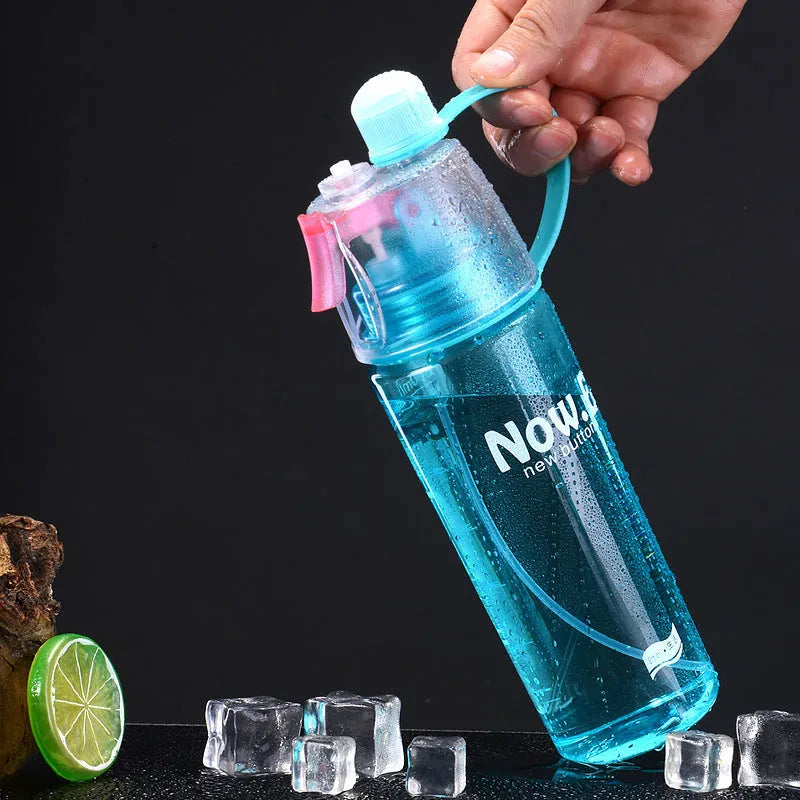 Green portable outdoor mist spray cup with handle and scale markings