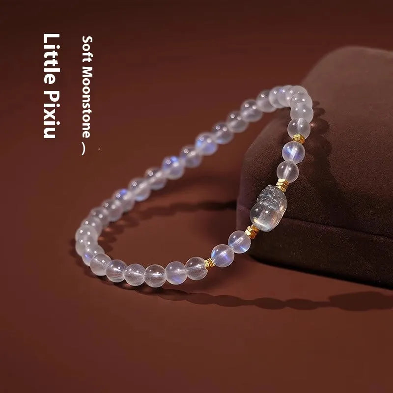 Moonstone bracelet with animal zodiac motif in national style design featuring blue light elements