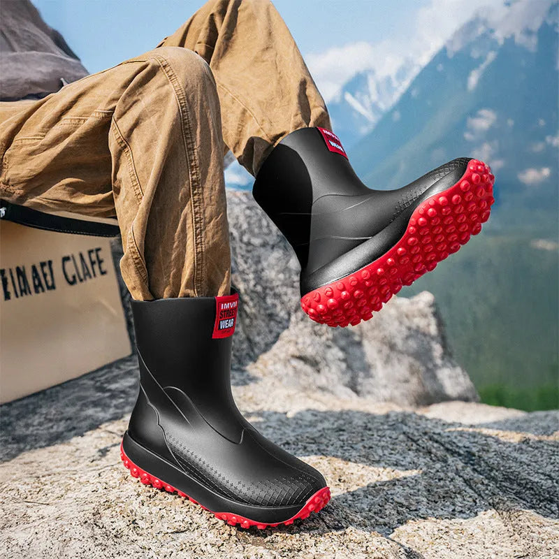 Men's PVC rain boots in black red colour with non-slip plastic soles and round toe design