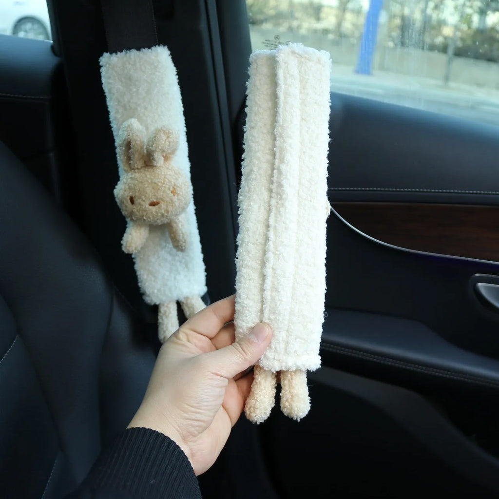 Cartoon plush rabbit and bear design car seat belt shoulder protector made from soft lamb wool.
