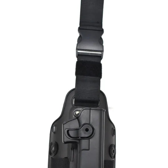 Black tactical plastic leg holster with quick-pull flap and MOLLE webbing on a belt.