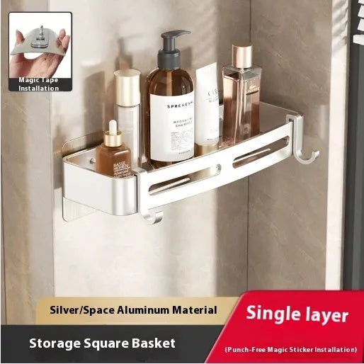 Gun grey punch-free bathroom corner storage rack with triangle basket mounted on wall.