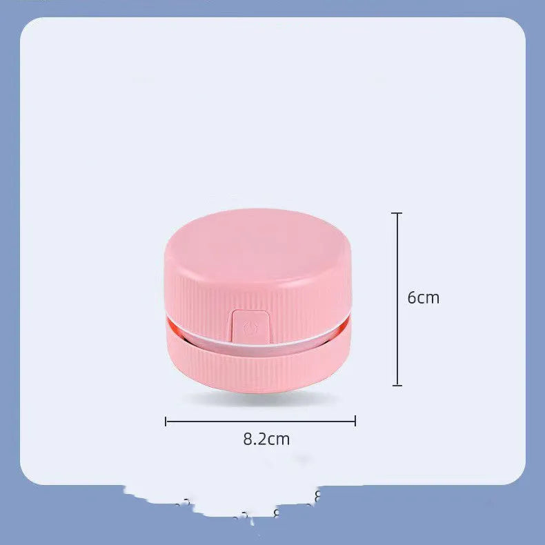 Portable mini desktop vacuum cleaner for pencil chips in pink colour with rechargeable battery