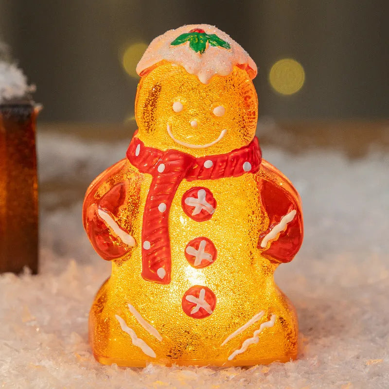 Glowing Christmas gingerbread man snowman ornament with a scarf in red, white, clear, or transparent red.
