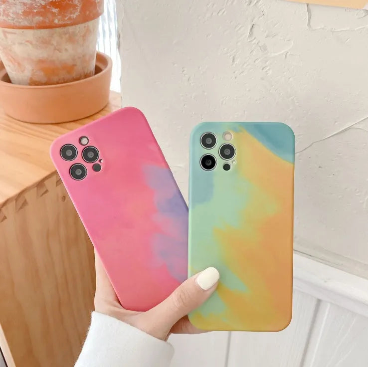 Abstract oil painting gradient geometric pattern on a soft blue silicone case for Apple iPhone.