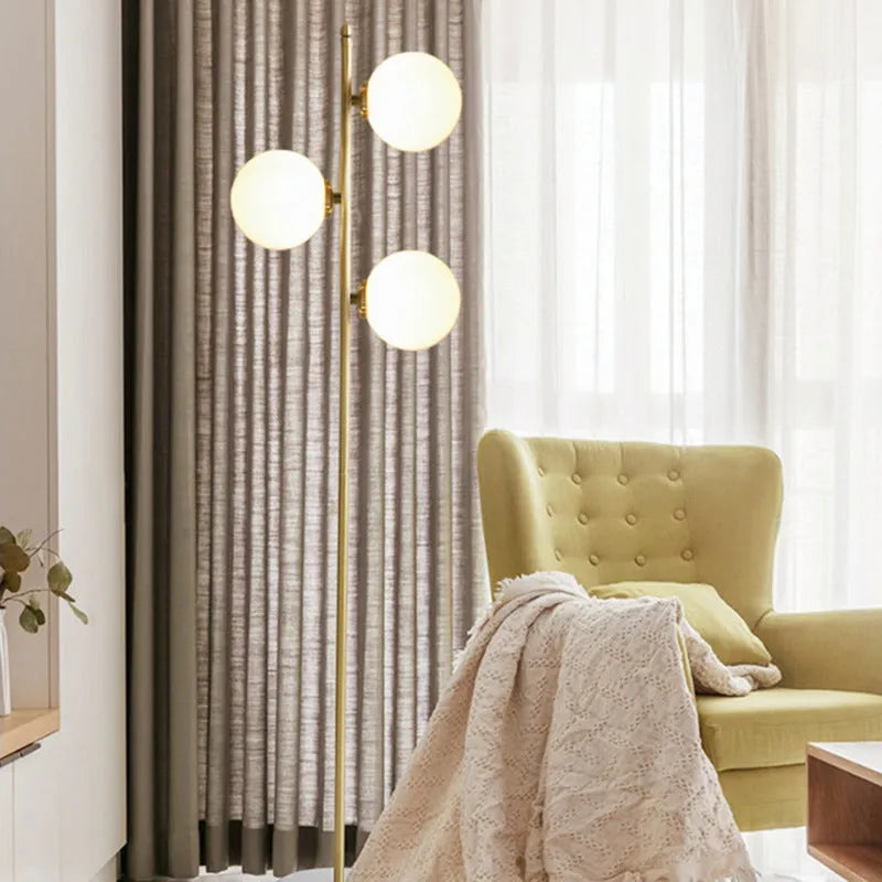 Creative minimalist floor lamp with gold aluminium alloy frame and glass detail, 155cm height, warm LED light