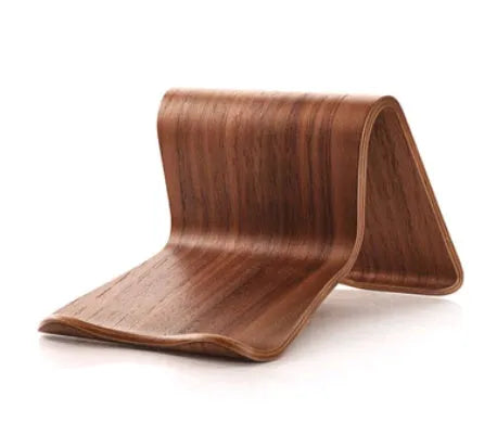 Bamboo wood tablet phone holder on desk with an Apple iPad propped up in landscape mode