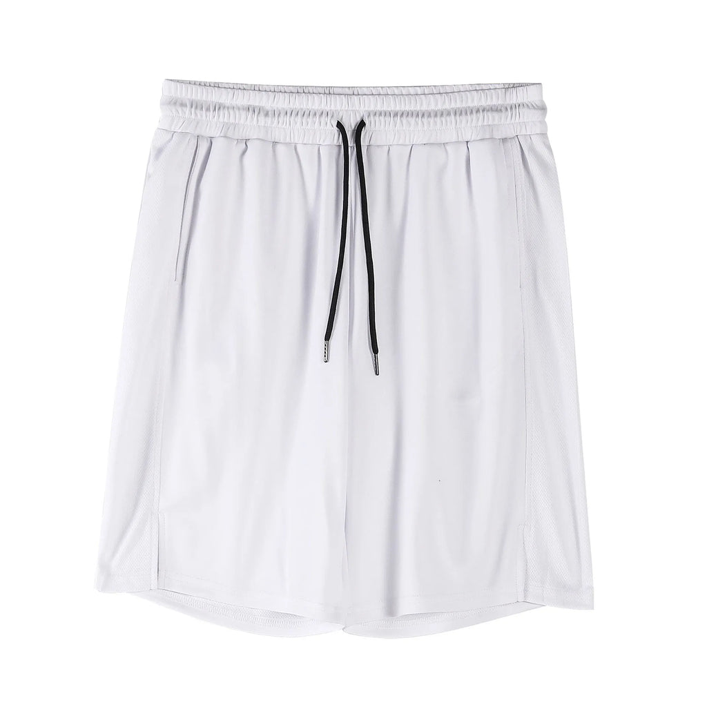 Man wearing loose black quick-dry polyester fitness shorts with an elastic waistband.