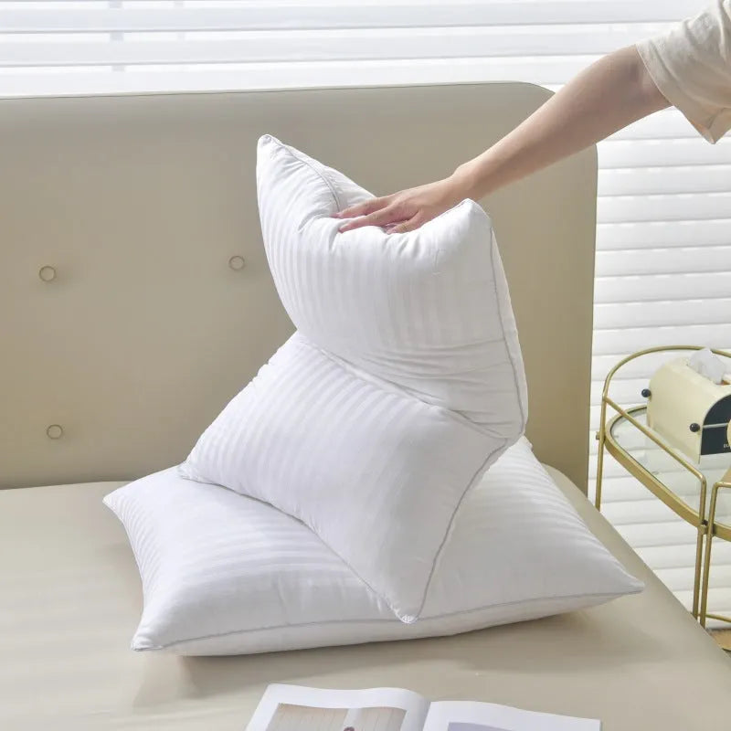 White hotel cotton satin stripe pillow with feather cotton filling shown in three size options.