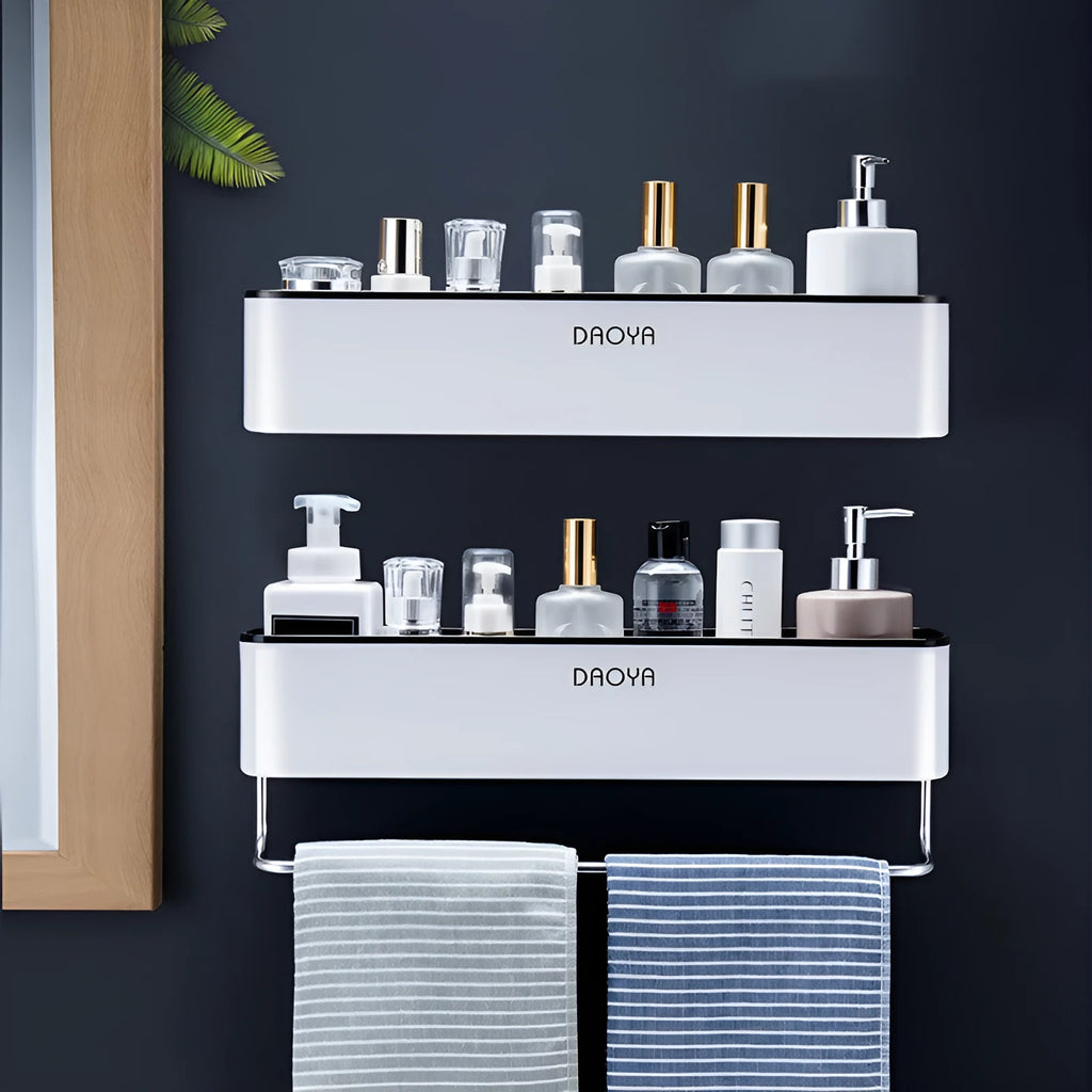 Plastic bathroom wall shelf with hole-free installation, shown holding shampoo and shower gel bottles.