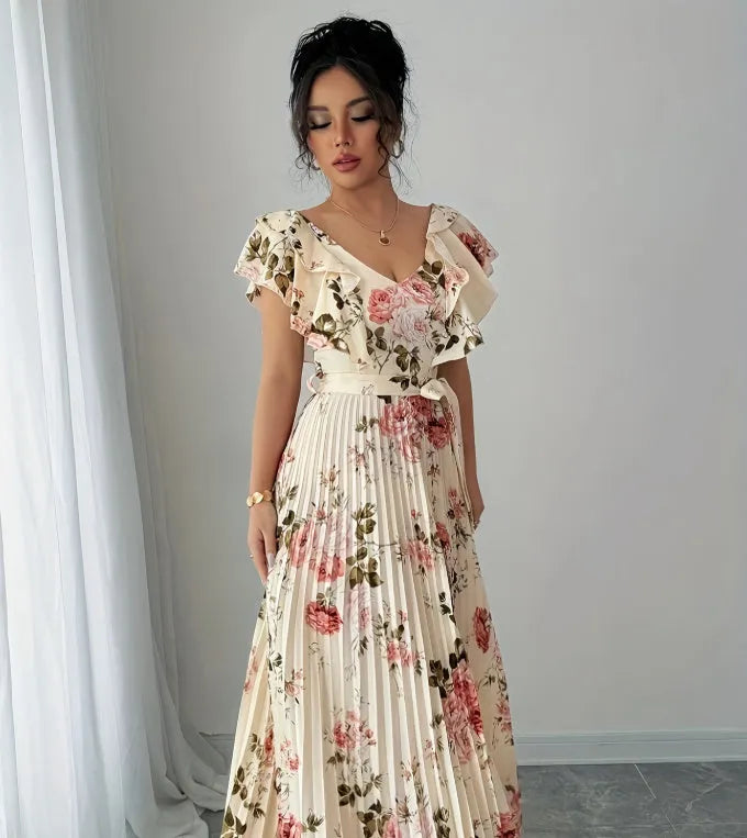 Apricot floral print women's dress with V-neck, ruffle sleeves, and a high-waisted A-line skirt.