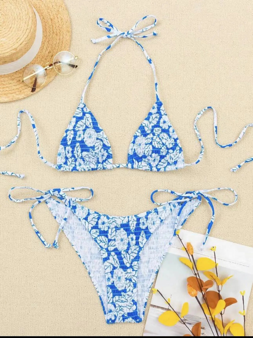 Women's floral print halter swimsuit set in light blue colour with briefs style