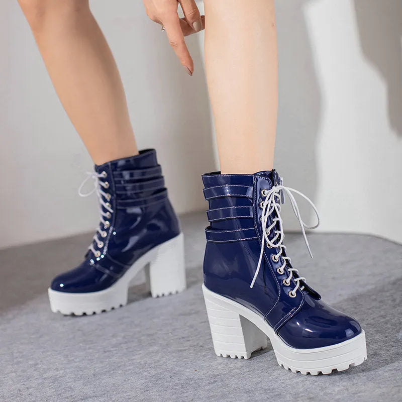 Women's black casual lace-up ankle boots with a chunky heel and thick rubber sole.