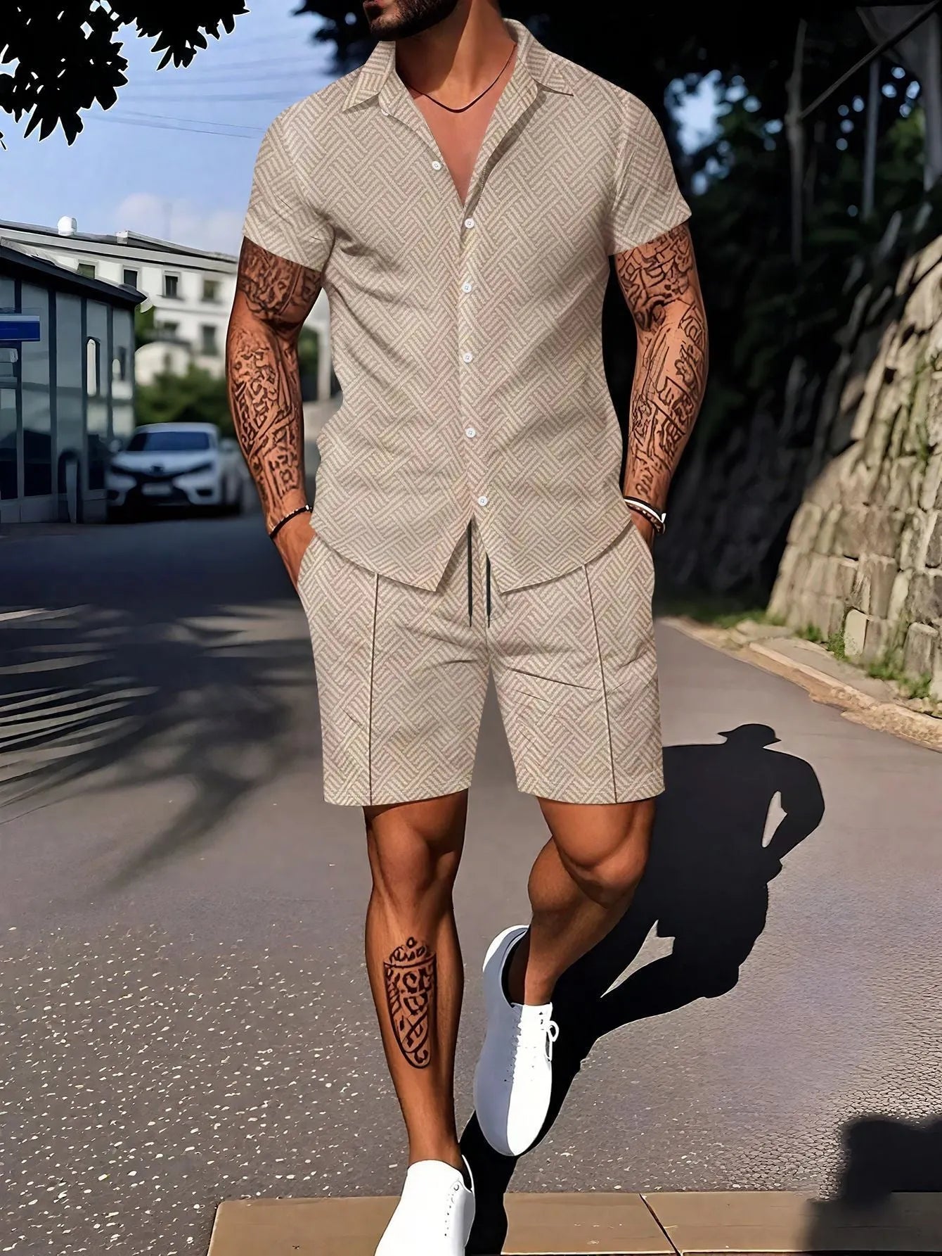 Man wearing a digital print short sleeve top and matching shorts from a casual suit set.