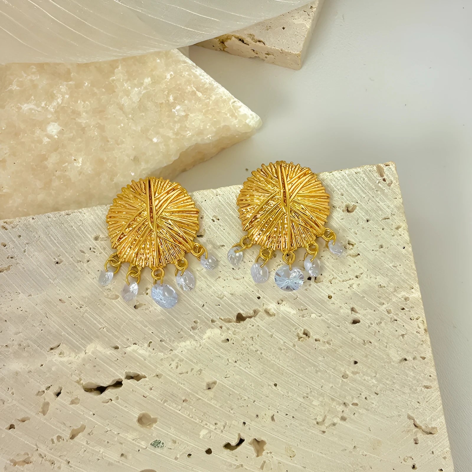 Gold geometric women's earrings with round elements in electroplated metal