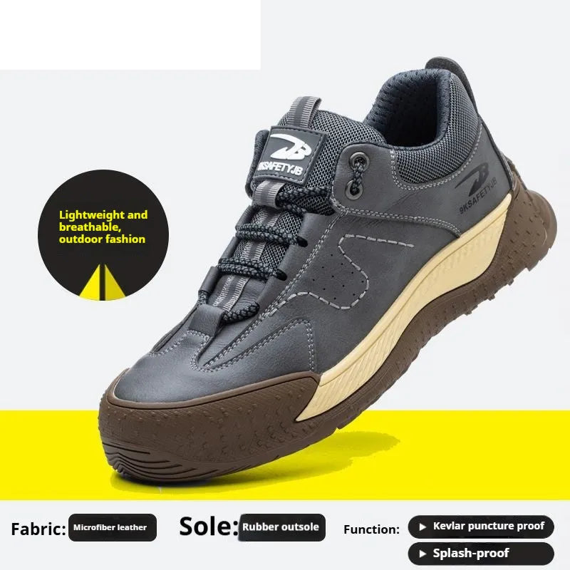 Men's black leather work safety shoes with a rubber sole and Flyknit-style upper on a work site background.