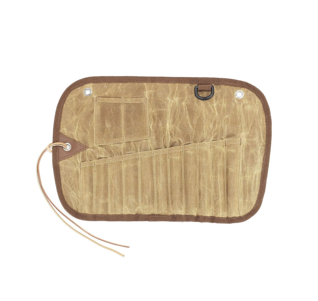 Waxed canvas tableware storage bag containing wooden handle cutlery set with chopsticks, knife, fork and spoons