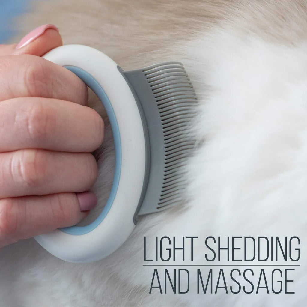 Small blue pet grooming comb with ergonomic handle for cat and dog hair removal