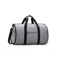 Medium cylinder travel bag in black showing zipper opening and cylindrical shape.