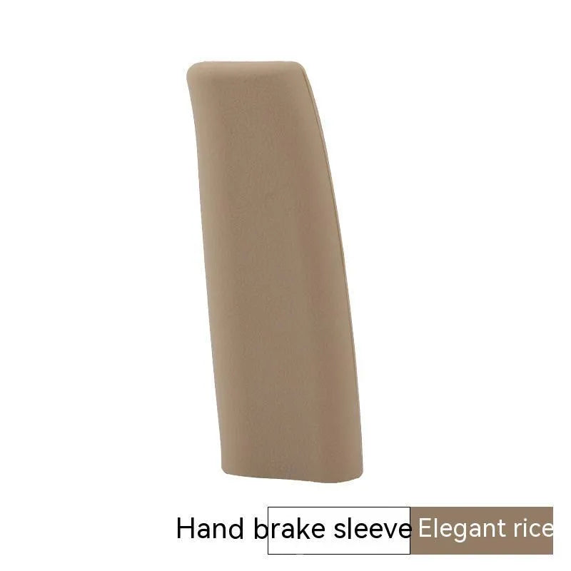 Universal silicone handbrake sleeve in red, shown next to a car's handbrake lever.