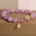 Purplish red jade hare head crystal bracelet with adjustable design for wrist wear