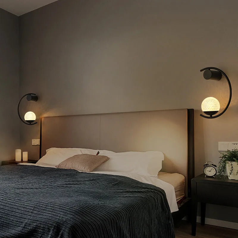 Modern minimalist light luxury wall lamp in black finish with iron and acrylic construction, 22.5cm diameter, 30cm height