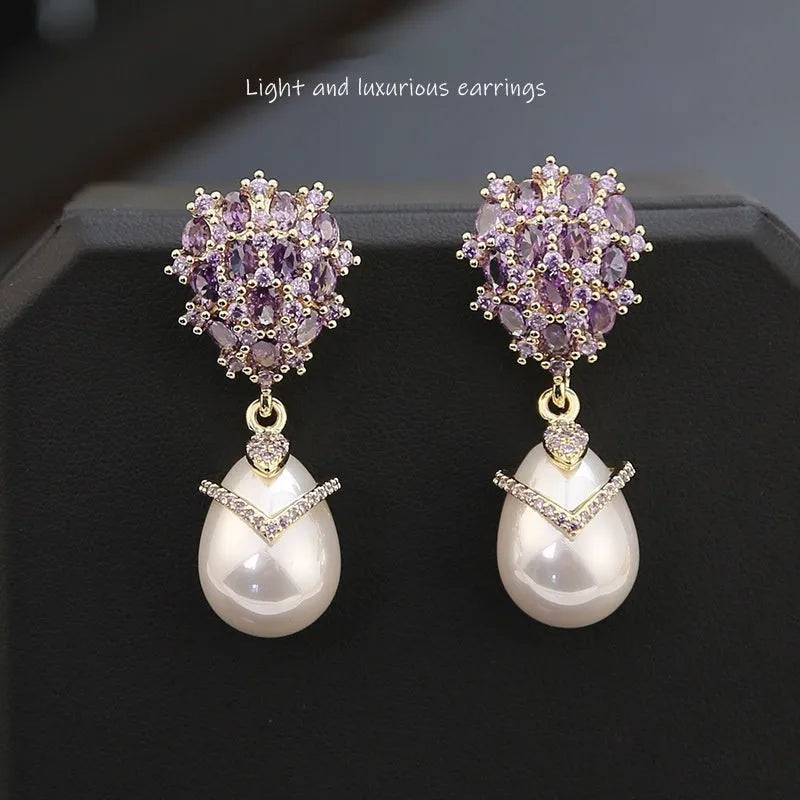 18K gold finish drop-shaped pearl earrings for women with zircon stones.
