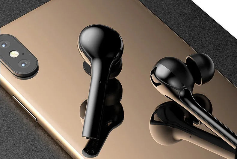 Black or white wireless in-ear headphones with charging case showing touch controls and Bluetooth 5.0 connectivity