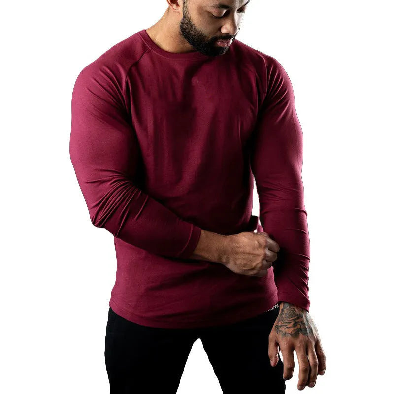 Men's tight-fit cotton sports t-shirt in army green, long sleeve, round neck.
