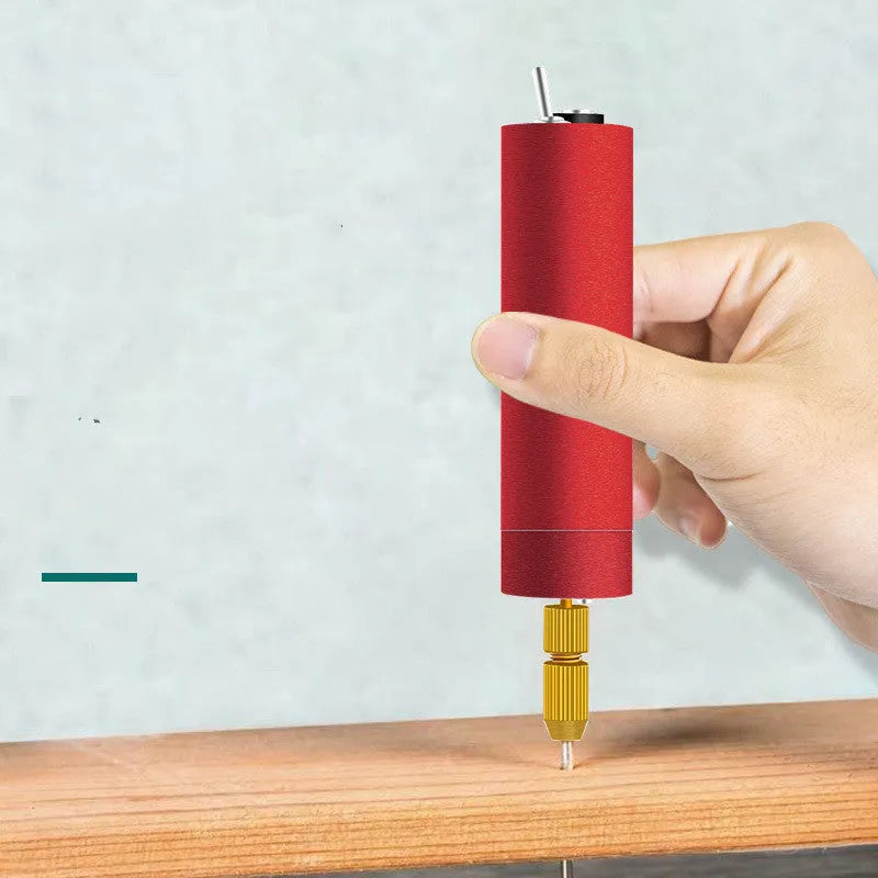 Small aluminium USB electric drill and grinder with three drill bits and cable on a white background.