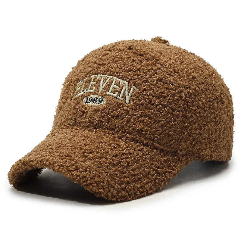 Adjustable winter baseball cap in lambskin polyester fabric showing dome crown design
